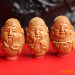 橄榄核雕艺术 财神老核大籽手串的文玩魅力