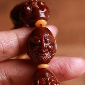 橄榄核手串机雕 传统核雕艺术的现代化转型与挑战